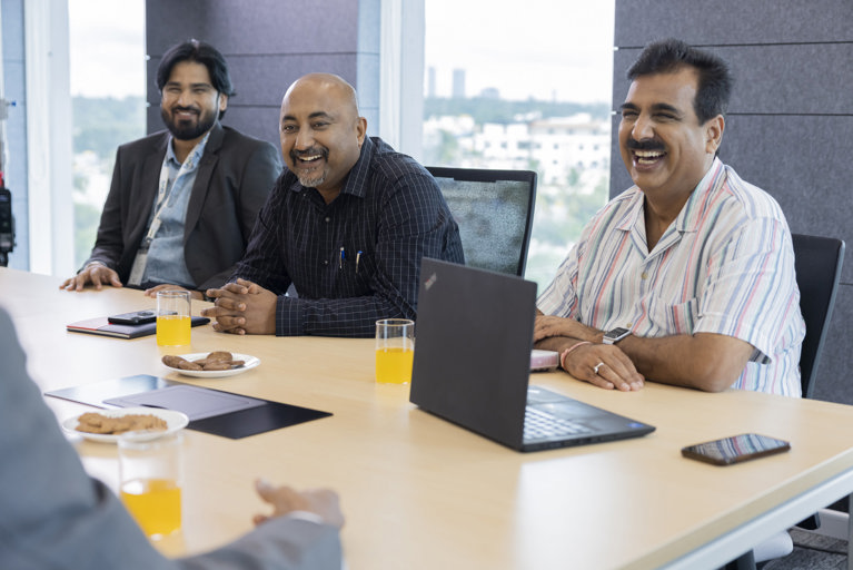Teva employees in a meeting room
